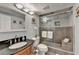 Stylish bathroom with vanity, sleek fixtures, and a glass-enclosed shower with built-in niche at 275 13Th Ne St # 310, Atlanta, GA 30309