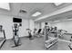 Well-equipped gym featuring modern exercise machines and mirrored walls at 275 13Th Ne St # 310, Atlanta, GA 30309