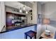 Modern kitchen with sleek countertops, stainless steel appliances, and stylish pendant lighting over the breakfast bar at 275 13Th Ne St # 310, Atlanta, GA 30309