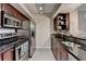 Well-equipped kitchen with stainless steel appliances, granite countertops, and sleek cabinetry for ample storage at 275 13Th Ne St # 310, Atlanta, GA 30309