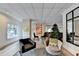 Bright living room features neutral decor, modern furnishings, and stylish accents at 275 13Th Ne St # 310, Atlanta, GA 30309