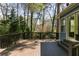 Spacious backyard deck overlooking a serene wooded area at 621 Spruce Dr, Stone Mountain, GA 30083