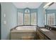 This bathroom has a large soaking tub and granite countertops at 621 Spruce Dr, Stone Mountain, GA 30083