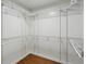 Empty walk-in closet featuring wire shelving and hardwood floors at 621 Spruce Dr, Stone Mountain, GA 30083