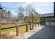 Large backyard with an expansive deck and string lights, perfect for outdoor entertaining and relaxation at 1199 Murray Sw Cir, Marietta, GA 30064