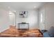 Inviting entryway features hardwood floors, white shiplap accent wall, and stylish decor at 1199 Murray Sw Cir, Marietta, GA 30064