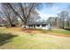 Charming single-story home with a well-maintained lawn and mature trees at 1199 Murray Sw Cir, Marietta, GA 30064