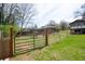 Fully fenced backyard ensures privacy and security for outdoor enjoyment and play at 1199 Murray Sw Cir, Marietta, GA 30064