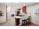 Cozy kitchen with cherry cabinets, granite countertops and stainless-steel appliances at 1199 Murray Sw Cir, Marietta, GA 30064