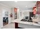 Bright kitchen with granite countertops and stainless-steel appliances flowing to living space at 1199 Murray Sw Cir, Marietta, GA 30064