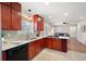 Open kitchen with stainless-steel appliances, modern sink, and a view into living space at 1199 Murray Sw Cir, Marietta, GA 30064