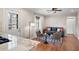 Cozy living room featuring a granite countertop, plush seating, a ceiling fan, and a large window at 1199 Murray Sw Cir, Marietta, GA 30064