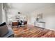 Comfortable living room features hardwood flooring, ceiling fan and stylish seating at 1199 Murray Sw Cir, Marietta, GA 30064