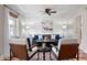 Open living room features wood floors, a ceiling fan, and modern decor at 1199 Murray Sw Cir, Marietta, GA 30064