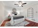 Stylish main bedroom with shiplap accent wall, hardwood floors, and a decorative rug at 1199 Murray Sw Cir, Marietta, GA 30064