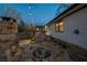 View of stone fireplace, stone patio and backyard at 1199 Murray Sw Cir, Marietta, GA 30064