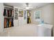 Spacious walk-in closet featuring custom shelving and ample storage space for clothing and accessories at 1249 Austin Thomas Dr, Dacula, GA 30019