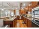 Modern kitchen with granite countertops, stainless steel appliances, and ample cabinet space at 1249 Austin Thomas Dr, Dacula, GA 30019