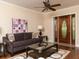 Spacious living room showcasing hardwood floors, an exterior door, and neutral wall colors at 2380 Strathmore Dr, Atlanta, GA 30324