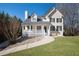 Charming two-story home with a welcoming front porch and well-maintained lawn at 274 Sleepy Hollow Rd, Powder Springs, GA 30127