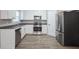 Modern kitchen featuring stainless steel appliances, sleek countertops, and ample cabinet space at 274 Sleepy Hollow Rd, Powder Springs, GA 30127
