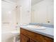 Bathroom area featuring a tub, a lavatory and a toilet at 100 Walnut Ct, Stockbridge, GA 30281
