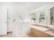 A bath with a walk in tub with safety bar and tiled step at 100 Walnut Ct, Stockbridge, GA 30281
