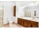 Comfortable bathroom featuring a double sink vanity and walk in shower at 100 Walnut Ct, Stockbridge, GA 30281