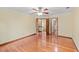 Expansive bedroom with hardwood floors and an open doorway at 2050 Plantation Rd, Lawrenceville, GA 30044