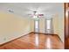 Bright bedroom with hardwood floors, crown molding, and a ceiling fan at 2050 Plantation Rd, Lawrenceville, GA 30044