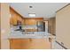 Spacious kitchen with stainless appliances, island with breakfast bar, and plenty of cabinet space at 2050 Plantation Rd, Lawrenceville, GA 30044
