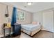 Bedroom with neutral colors, window and wood floors at 2224 Bridle Ct, Norcross, GA 30071