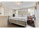 Cozy bedroom featuring a stylish bed, lots of natural light, and charming decor creating a welcoming ambiance at 2224 Bridle Ct, Norcross, GA 30071