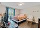 Cozy bedroom with natural light, decorative curtains, and neutral walls at 2224 Bridle Ct, Norcross, GA 30071