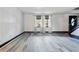 View of living room showcasing gray wood floors and natural light at 2224 Bridle Ct, Norcross, GA 30071