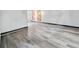 View of living room showcasing gray wood floors and natural light at 2224 Bridle Ct, Norcross, GA 30071
