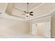 A bedroom view with neutral walls, a ceiling fan, and natural light at 3284 Kylee Dawn Cir, Lawrenceville, GA 30045