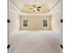 Spacious bedroom with carpet, and tray ceiling at 3284 Kylee Dawn Cir, Lawrenceville, GA 30045