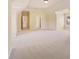 Bonus room with large open space, neutral paint, carpet, and a window for natural light at 3284 Kylee Dawn Cir, Lawrenceville, GA 30045