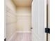 Walk-in closet with shelving at 3284 Kylee Dawn Cir, Lawrenceville, GA 30045