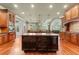 Gourmet kitchen with dual islands, custom cabinetry, granite counters, and modern stainless-steel appliances at 3284 Kylee Dawn Cir, Lawrenceville, GA 30045