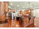 Elegant kitchen boasting granite countertops, custom cabinets, stainless steel appliances, and hardwood floors at 3284 Kylee Dawn Cir, Lawrenceville, GA 30045
