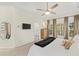 Large bedroom with neutral decor and lots of natural light at 3640 Ridgeway Ter, Suwanee, GA 30024