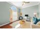 Cozy living room filled with natural light, a comfortable sofa, and stylish decor at 3640 Ridgeway Ter, Suwanee, GA 30024