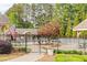 Community swimming pool enclosed by black fencing, offering a refreshing escape at 3640 Ridgeway Ter, Suwanee, GA 30024