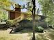 Home backyard featuring a deck and a staircase with wooden railings at 942 Ellison Ct, Austell, GA 30168