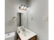 Bathroom with a decorative light fixture at 942 Ellison Ct, Austell, GA 30168