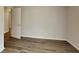 Neutral-toned bedroom featuring new vinyl flooring at 942 Ellison Ct, Austell, GA 30168