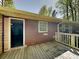 View of wooden deck with room entrance; perfect for outdoor relaxation at 942 Ellison Ct, Austell, GA 30168