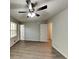 A comfortable living room featuring neutral walls and new vinyl plank flooring at 942 Ellison Ct, Austell, GA 30168